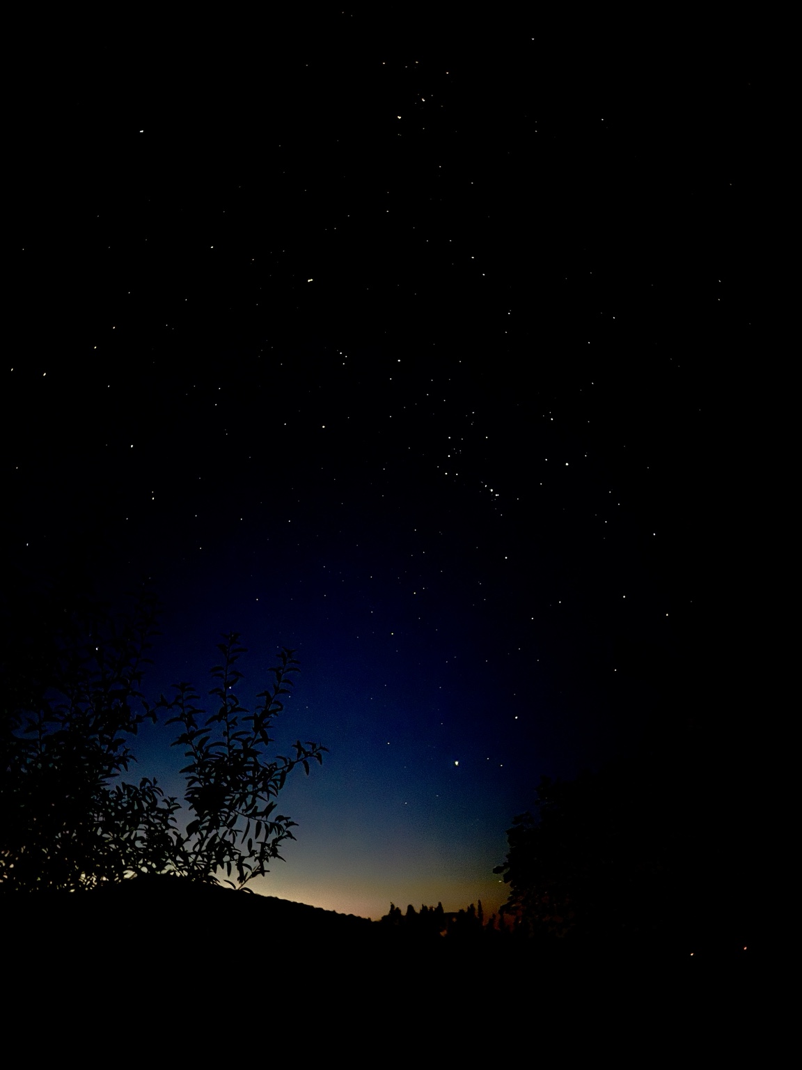 Stars and the first light of dawn seen from the guest room at Rancho Los Dragones Dorados