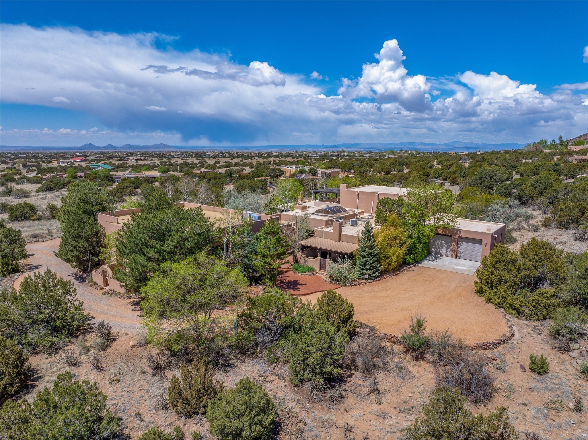 Aerial view of Rancho Los Dragones Dorados and the surrounding high desert